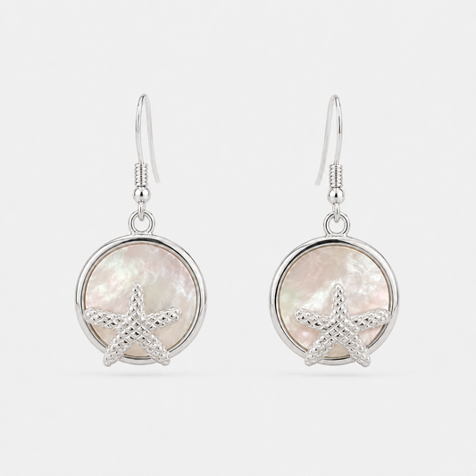 Boucles d'oreilles Étoile de mer en argent 925 et nacre naturelle sur fond gris clair