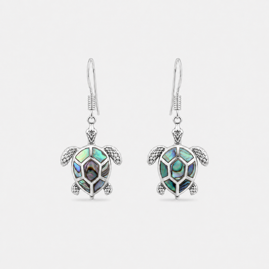 Boucles d'oreilles tortue en argent 925 et abalone naturelle sur fond gris clair